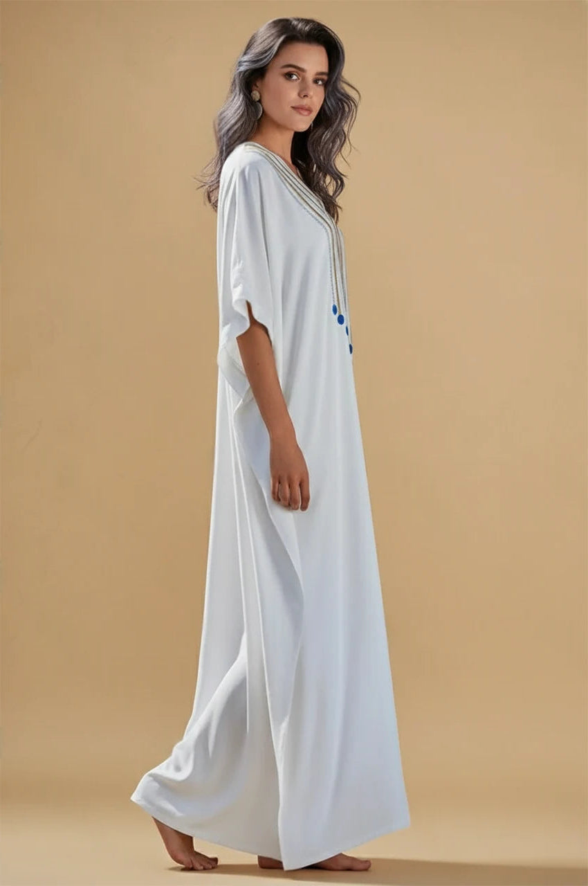 Kalila white Greek kaftan side profile with gold embroidered neckline