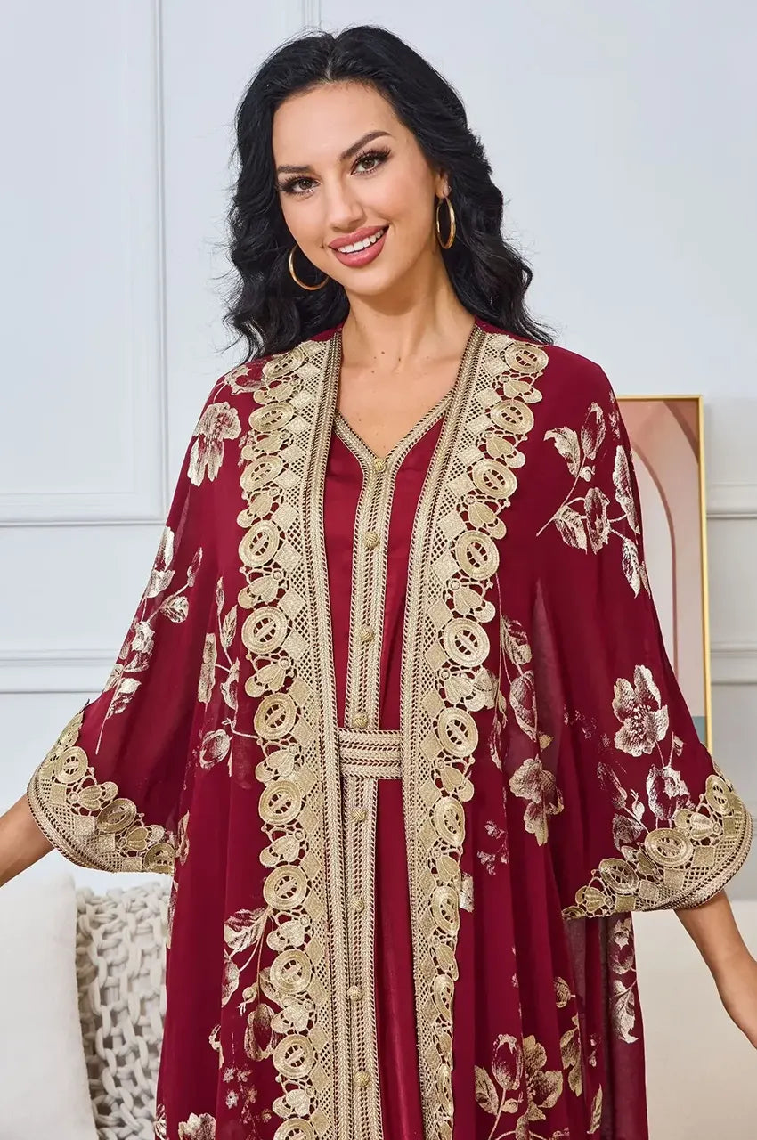 Close up of chest detailing and gold lace trim on Kalima red and gold 2 pieces kaftan.