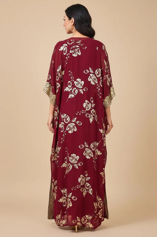 Back view of red and gold open kaftan showing gold floral stamped details.