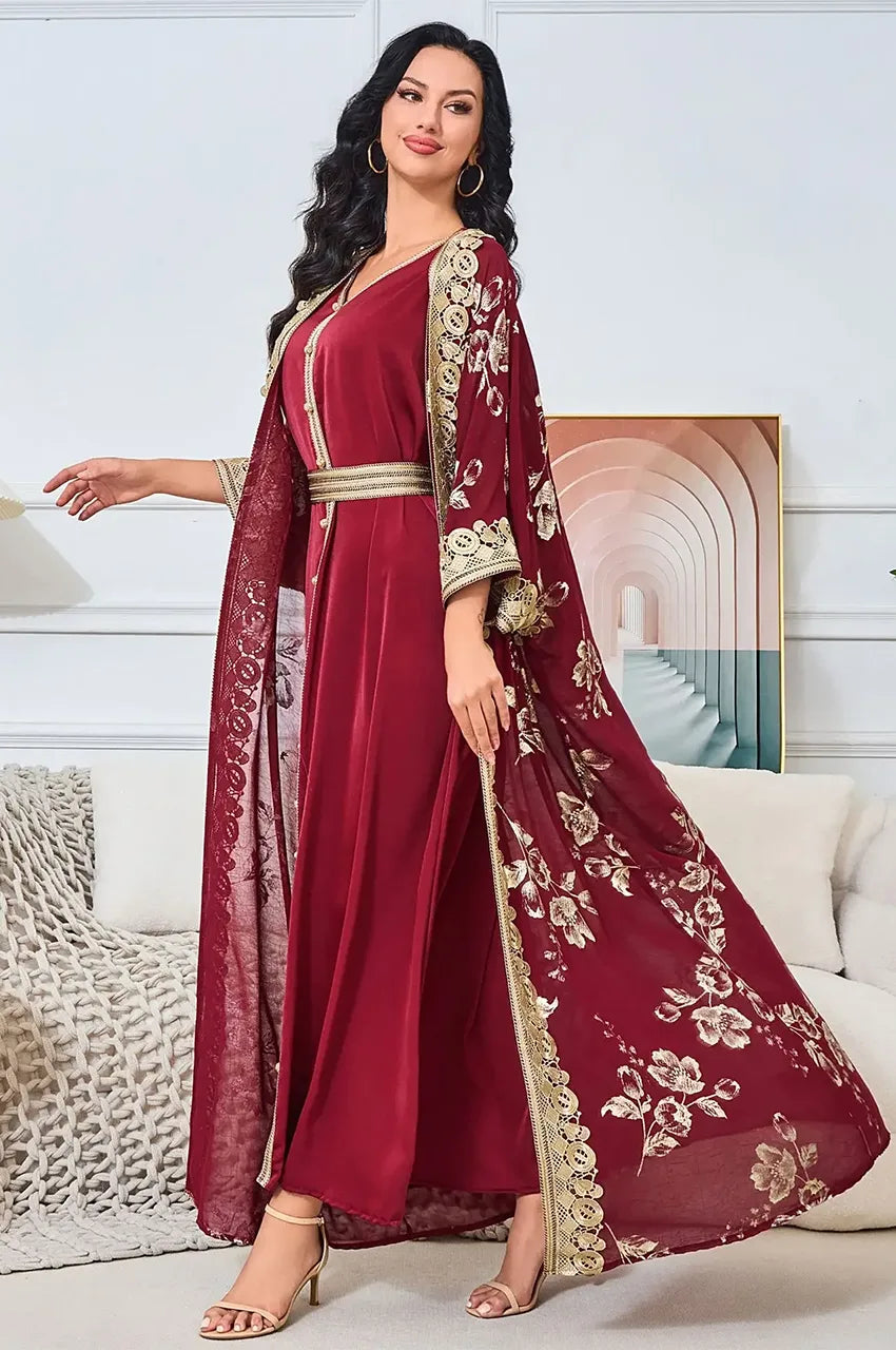 Angled view of Kalima kaftan highlighting the gold foil print contrast.