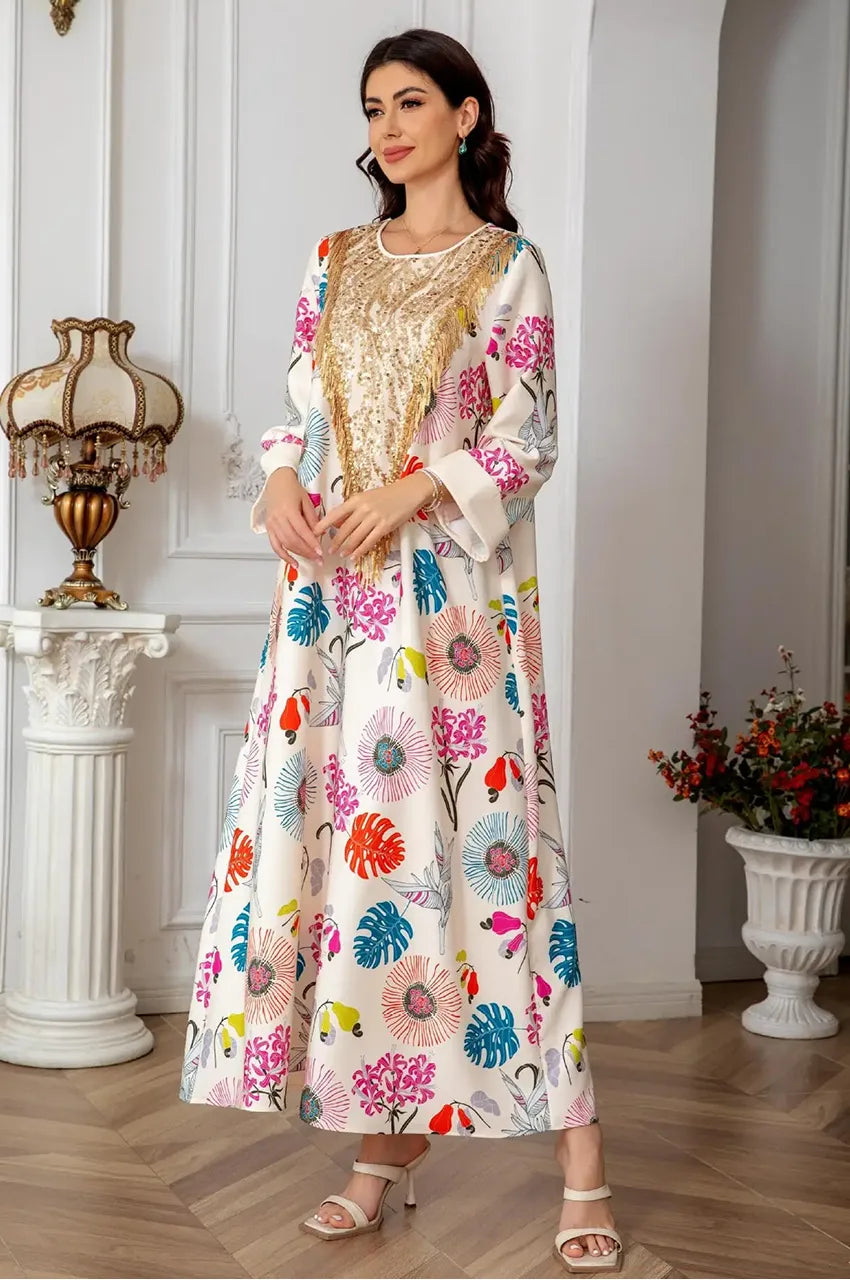 Angled front view of cream Kashmiri kaftan showing floral print and gold detailing