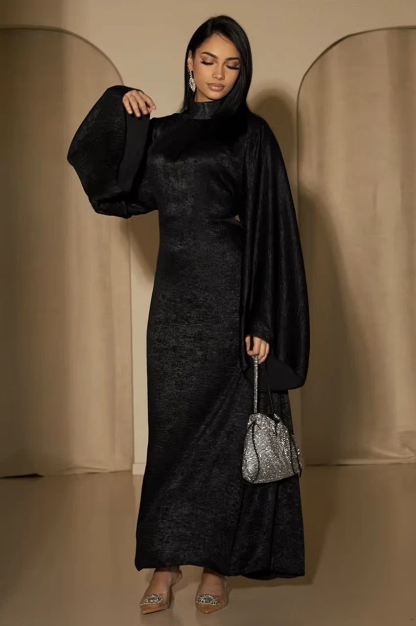Full-length front view of Kehlia metallic black kaftan dress with modest high neck and shimmer finish