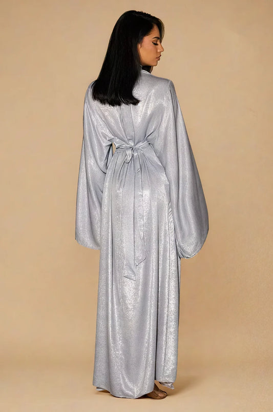Back view of Kehlia Metallic Silver Kaftan with waist tie and flowing batwing sleeves