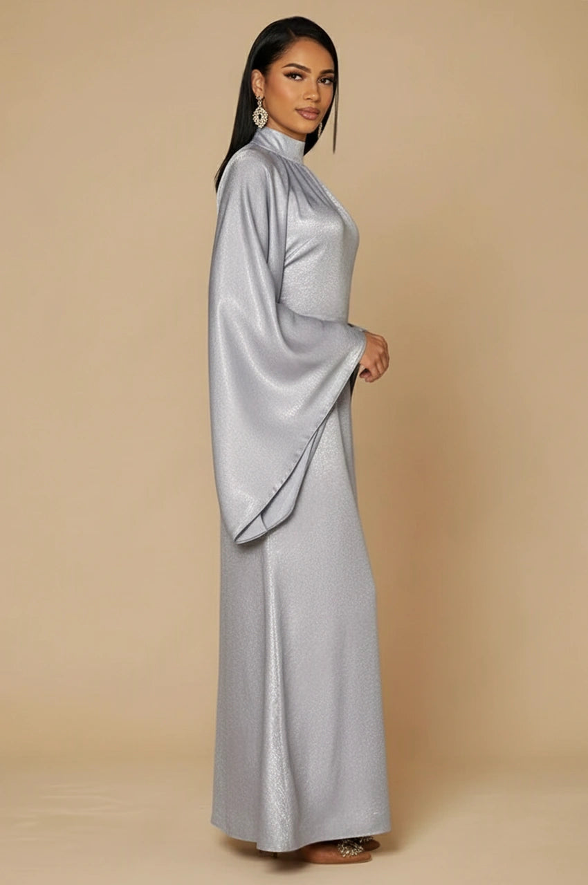 Metallic silver kaftan side view with high neck and draped sleeves – Kehlia
