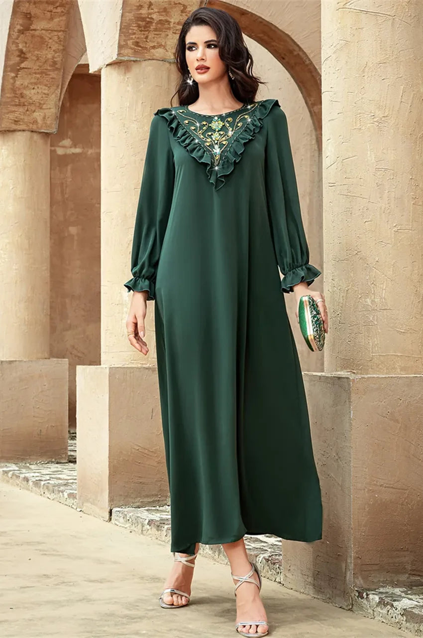 Fashion shot of Kenza green embellished kaftan dress