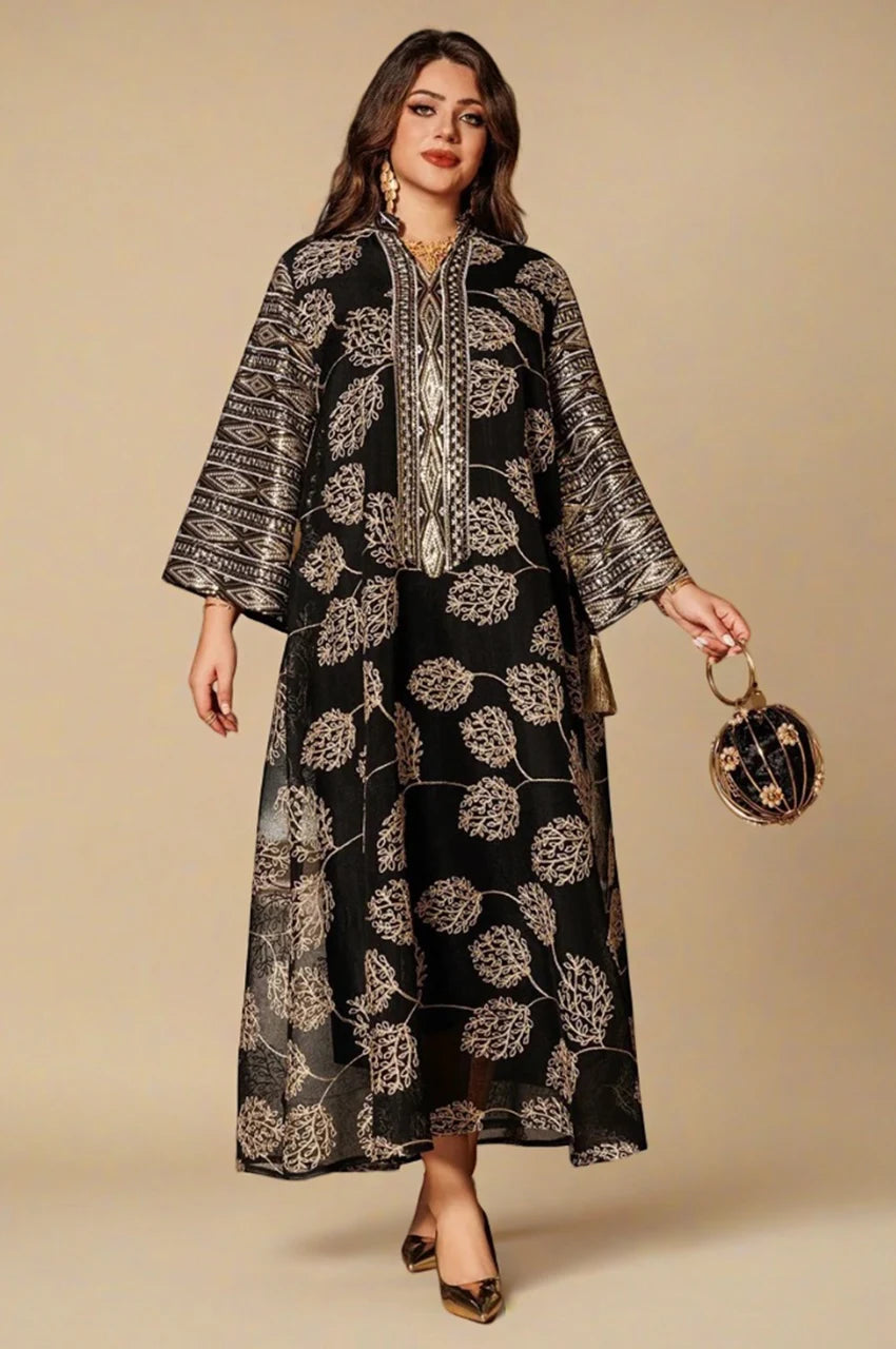 Leena black Persian kaftan front detail with intricate metallic patterns and tassels