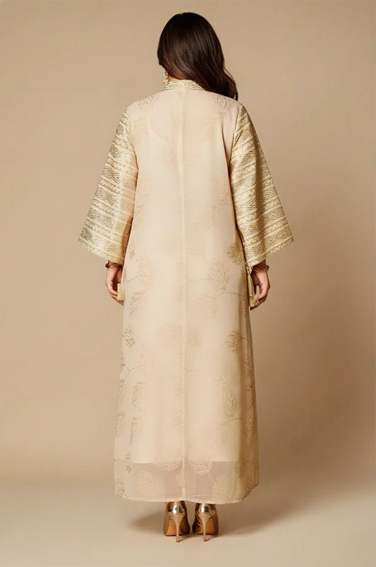 Back view of Leena White Persian Kaftan showing flowing silhouette and gold detailing