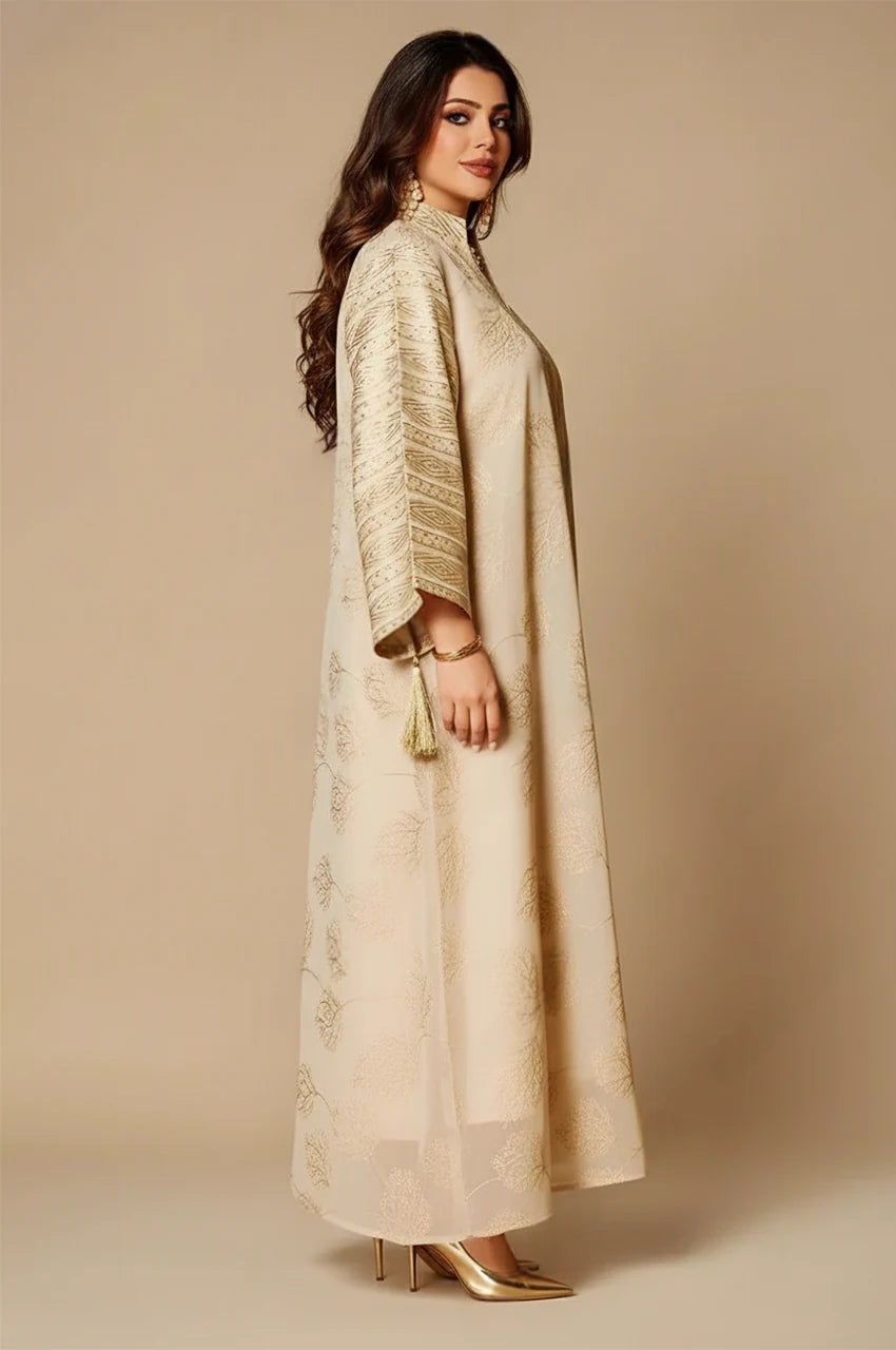 Side view of Leena White Persian Kaftan featuring flared sleeves and gold jacquard fabric