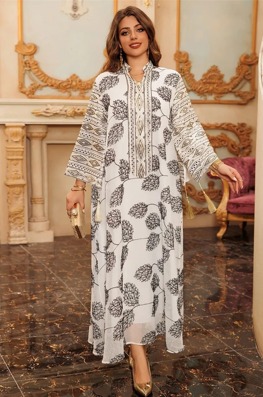 white Leena Persian kaftan on model walking indoor