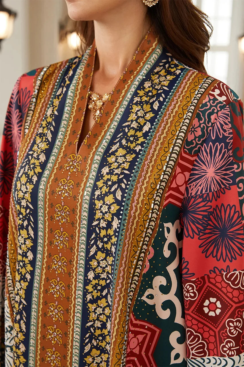 Close-up of Liara kaftan V-neckline and high-definition digital print detail.