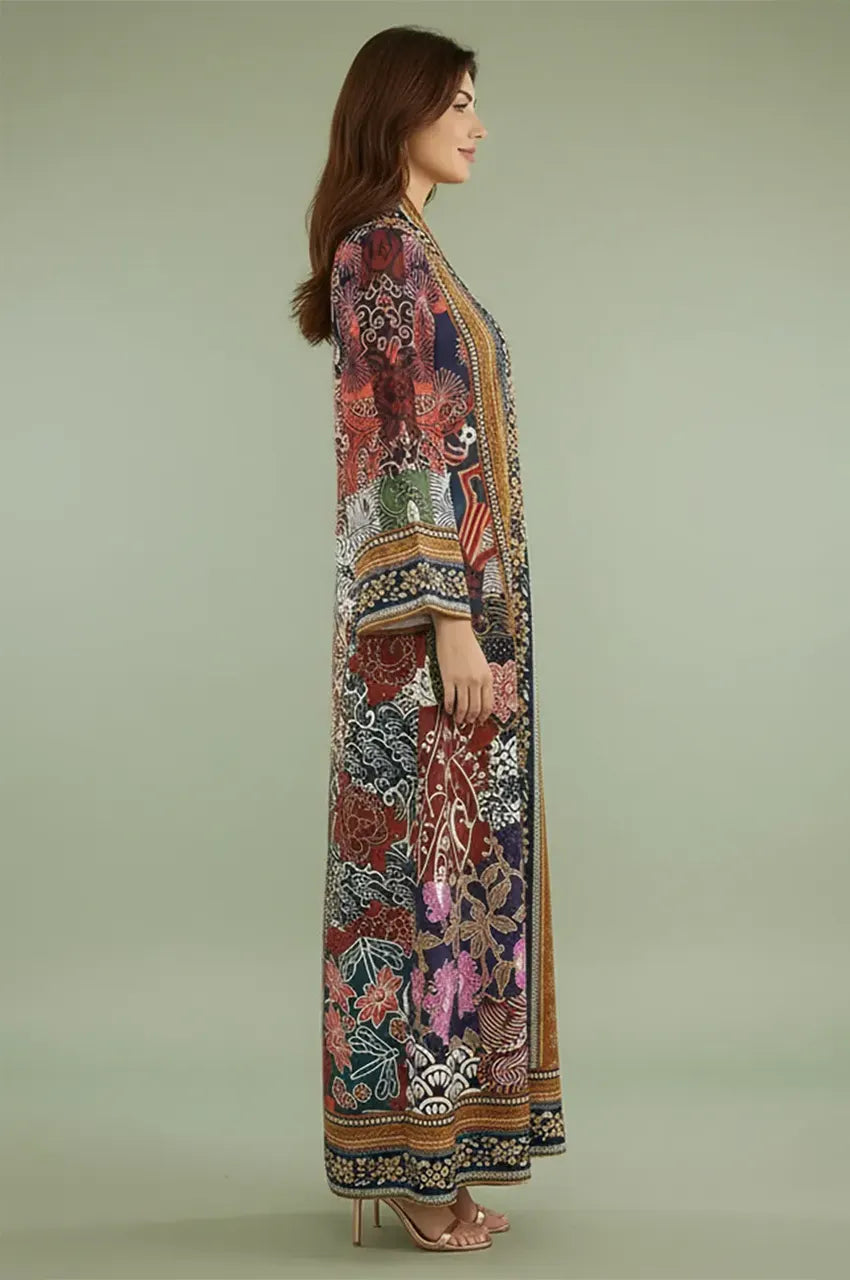 Side profile of the Liara digital print kaftan showing fluid floor-length silhouette.