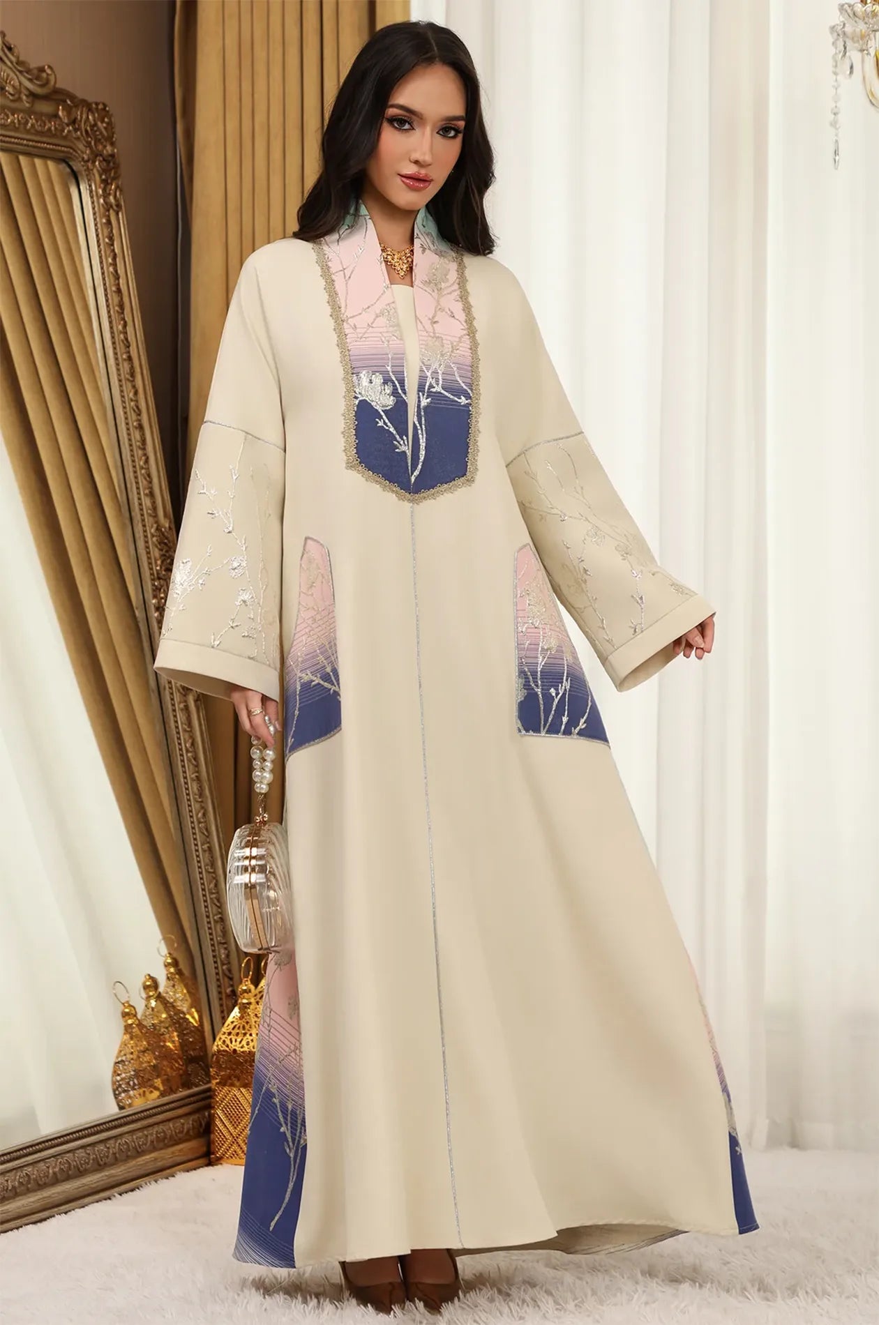 Elegant presentation of the Liorra Dark Blue Kaftan Ombre with a pearl-handled handbag, illustrating a sophisticated wedding guest look.