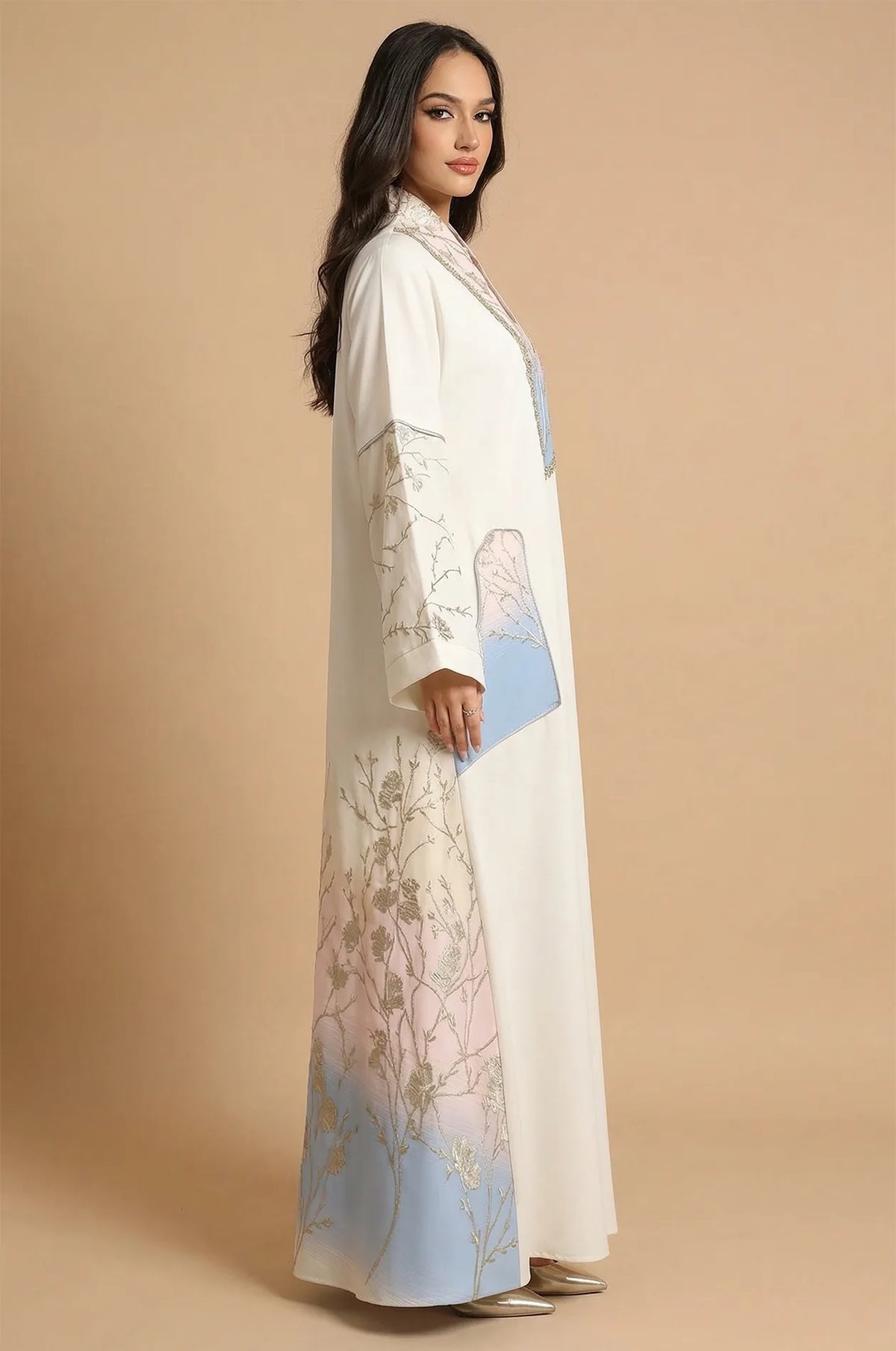 Side profile of the Liorra Light Blue Kaftan Ombre showing the elegant drape and the metallic floral branch embroidery.