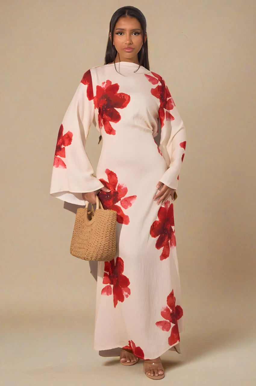 Full front view of Liyana white floral print maxi kaftan featuring oversized red flowers.