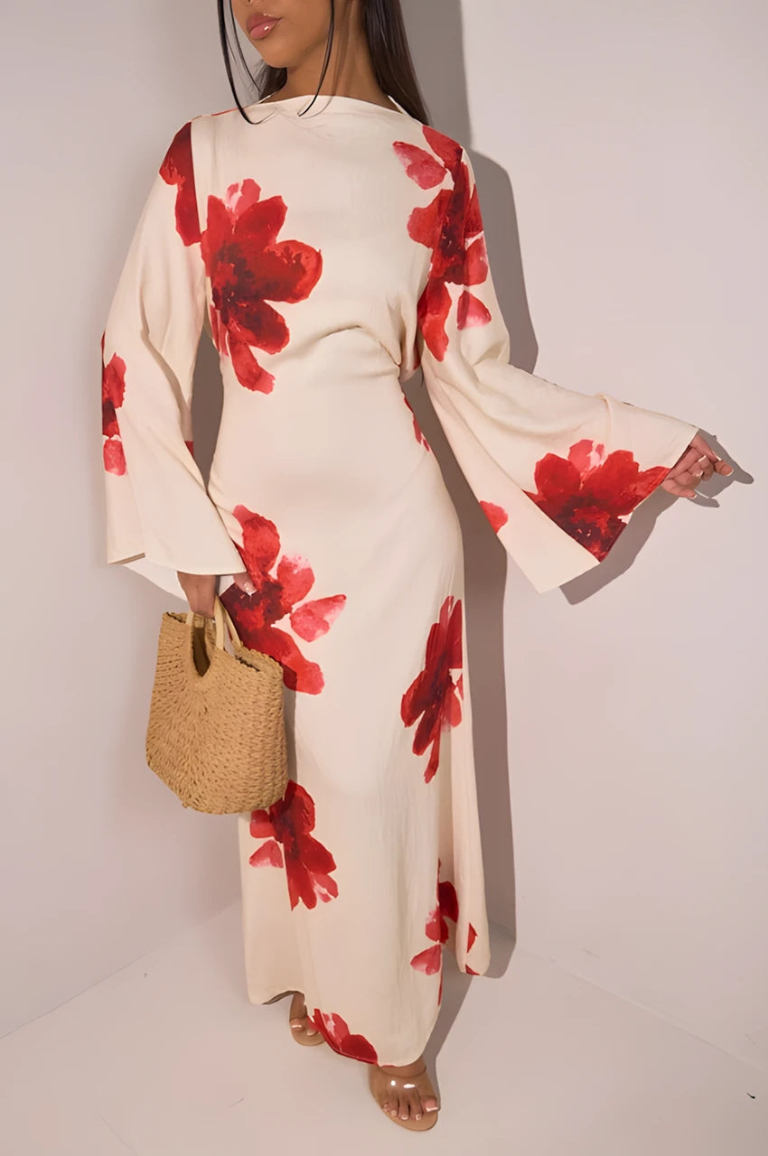Side view of white floral kaftan maxi dress with red flower print and flared sleeves