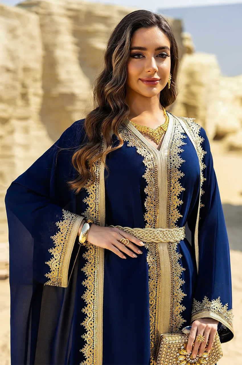 Close-up of gold Sfifa braided lace on the NAYRA royal blue long sheer kaftan.