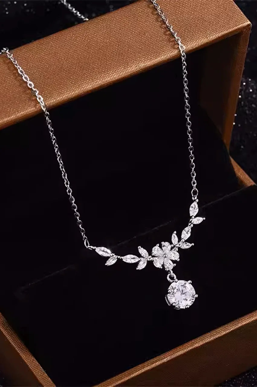 Luxury silver crystal necklace displayed in gift box showing floral detail