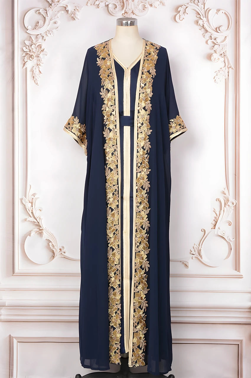 Full-length studio display of the luxury navy blue and gold kaftan with metallic embroidery.