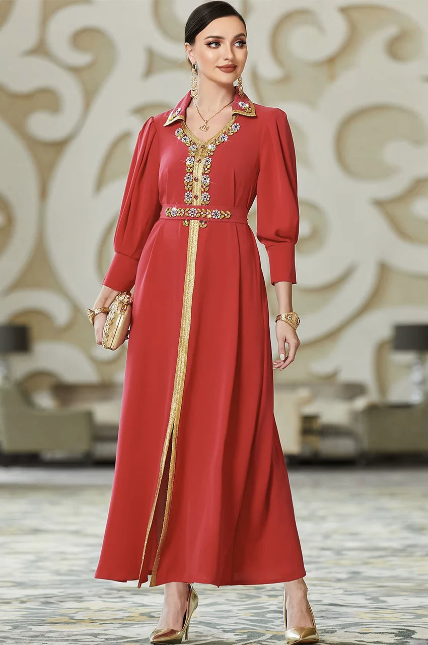 Model wearing the luxury Karia red orient kaftan made of fluid crepe fabric, designed for formal evening parties.