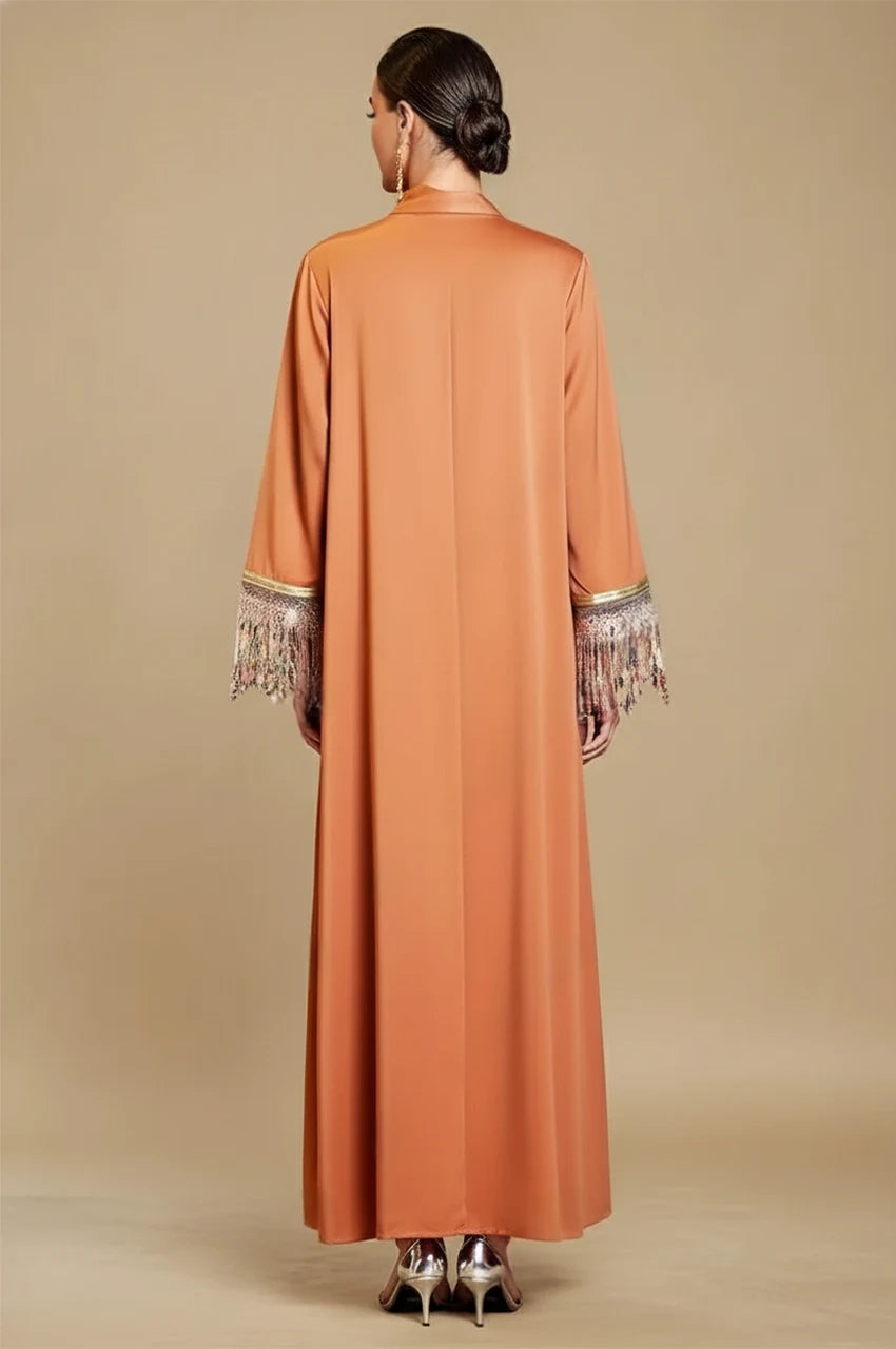 Luzia Orange Fringed Kaftan back view with satin bow tie detail and metallic fringe sleeves