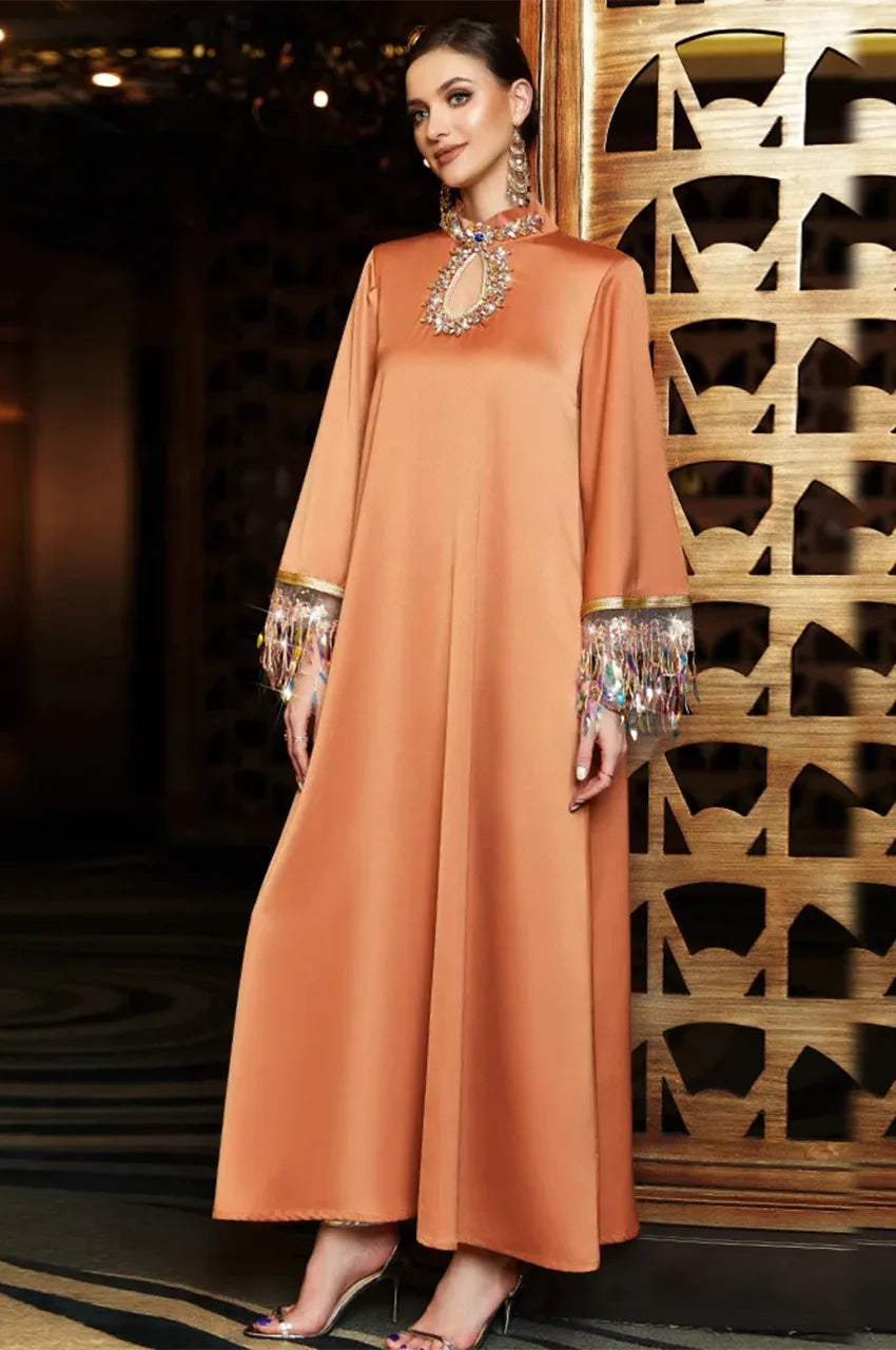 Fashion photoshoot of Luzia orange fringed kaftan dress