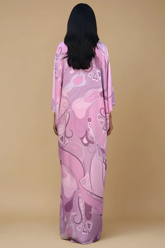 Back view of Lyra Pink Floral Kaftan Dress with fluid drape