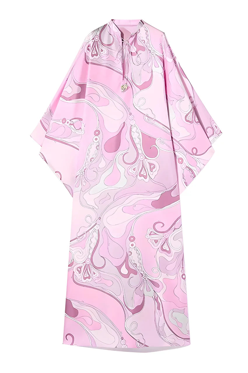 Close-up of Lyra Pink Floral Kaftan Dress fabric pattern and texture