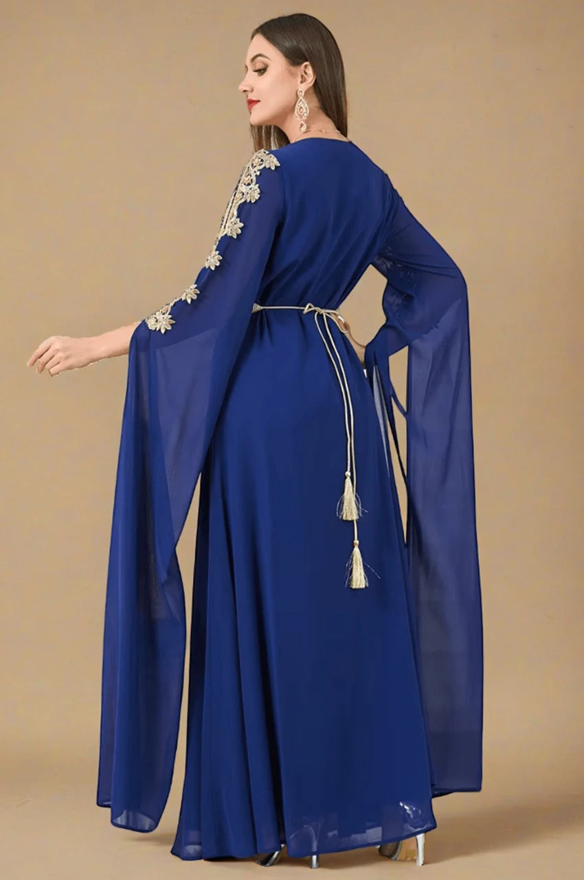 Back view of Maelis Blue Moroccan Traditional Kaftan with gold embroidery and cape sleeves