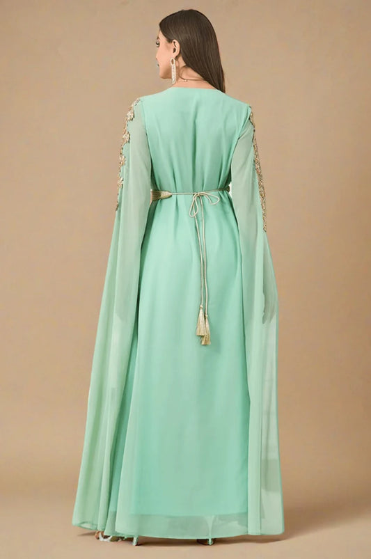 Back view of Maelis green Moroccan traditional kaftan with gold tasseled belt