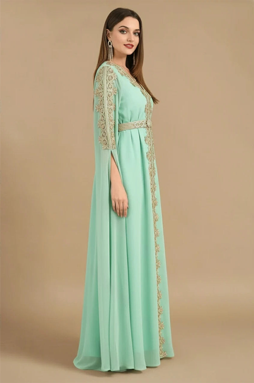 Side view of Maelis Green Moroccan Traditional Kaftan with gold embroidery and flowing chiffon