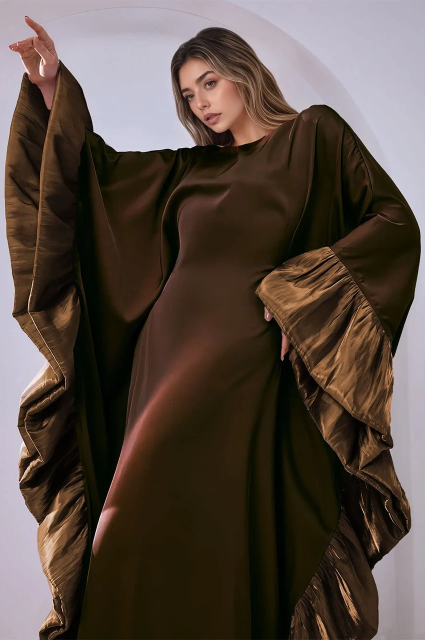 Close-up of satin texture and sleeve ruffle detail on the Malya brown kaftan