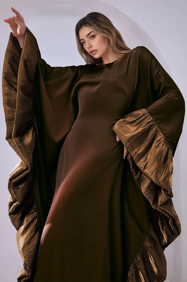 Close-up of satin texture and sleeve ruffle detail on the Malya brown kaftan