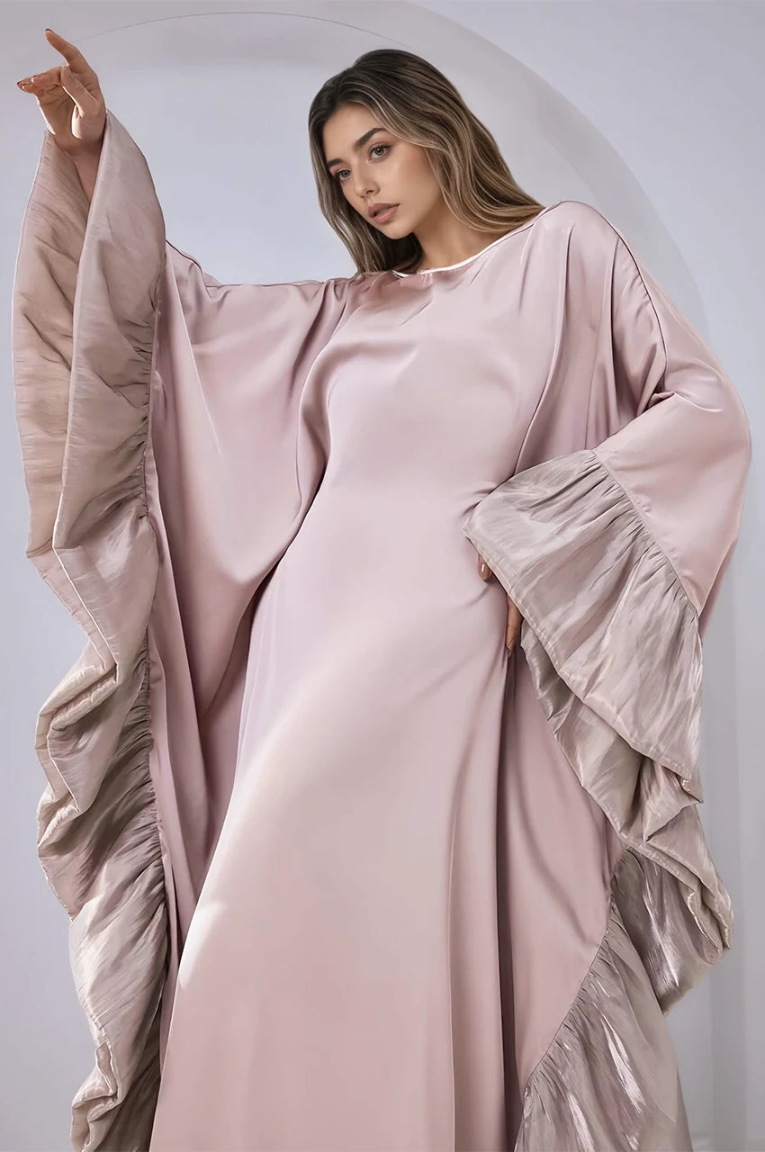 Close-up of ruffle sleeve detail on the Malya pink ruffle kaftan