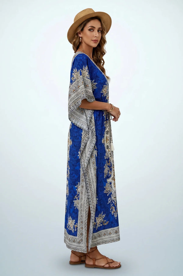 Side profile of blue mandala kaftan showing flowing drape and side slit