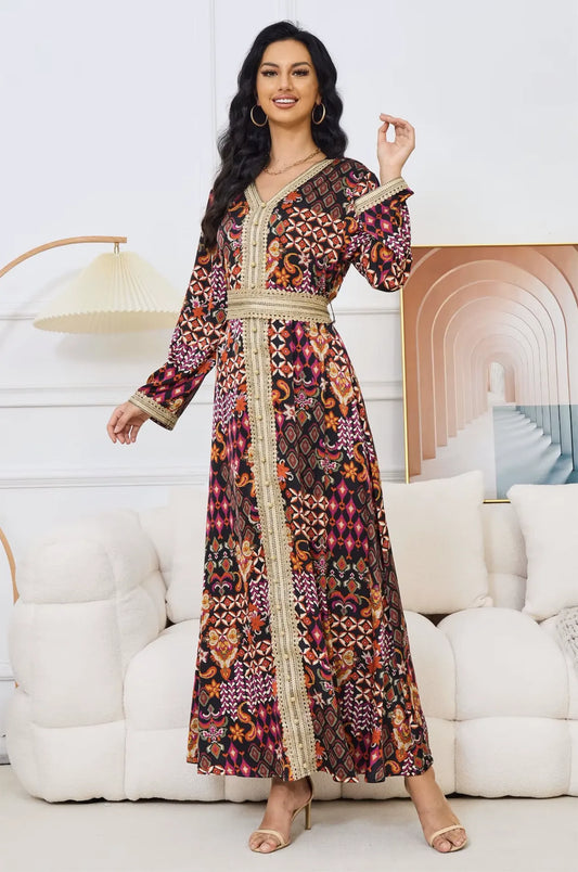 Fashion pose of the Maris tribal kaftan highlighting the flowy fabric.