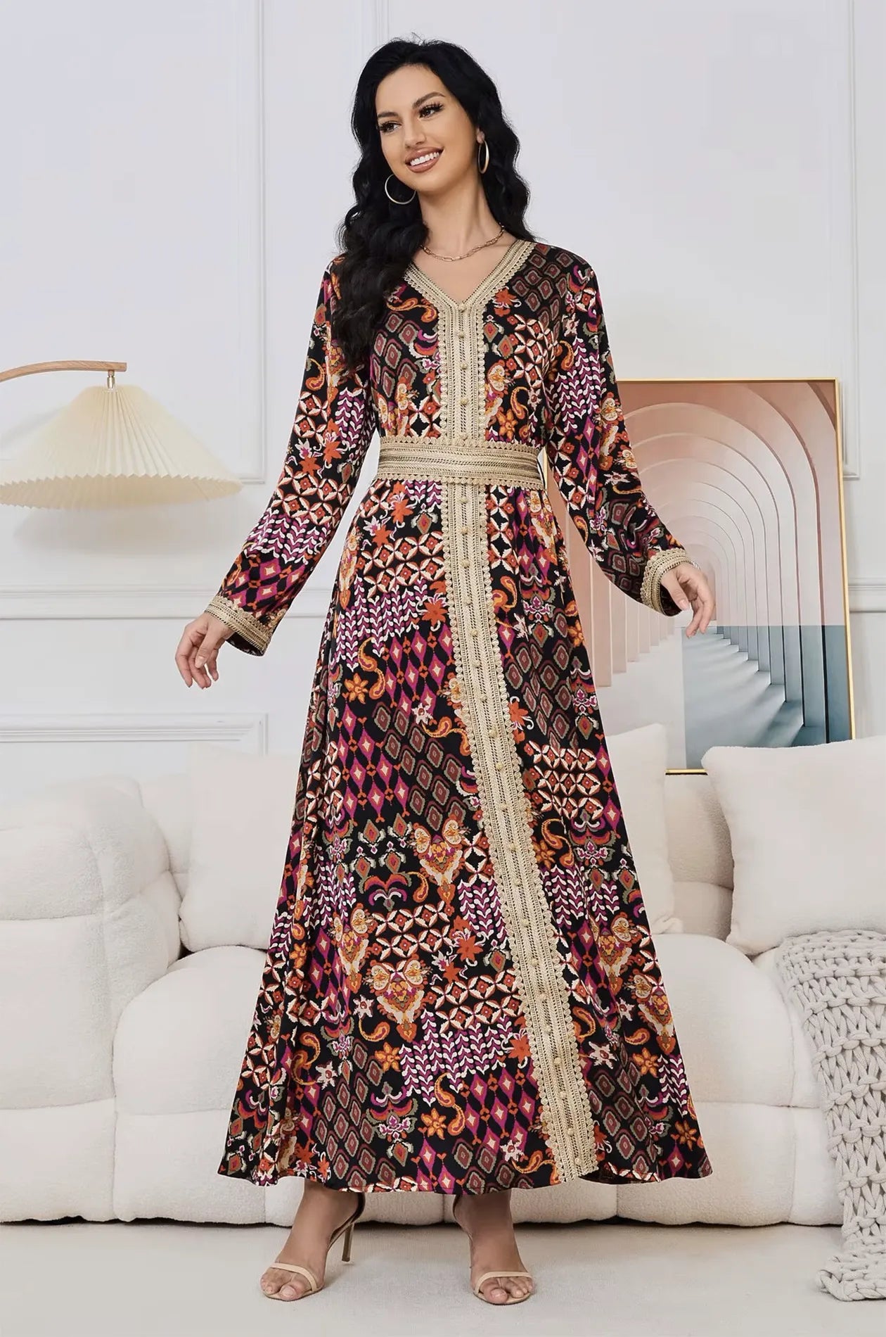 Full-length shot of the Maris tribal luxury dress with embroidered details.