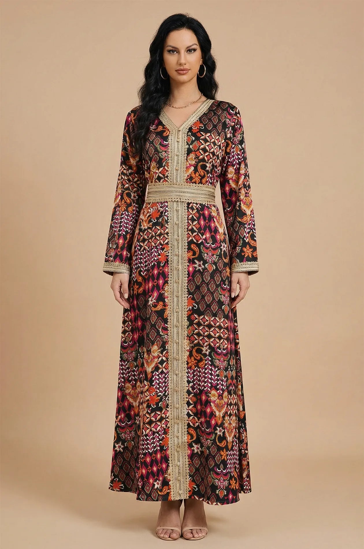 Front view of Maris Tribal Kaftan in multicolor geometric print with gold belt.
