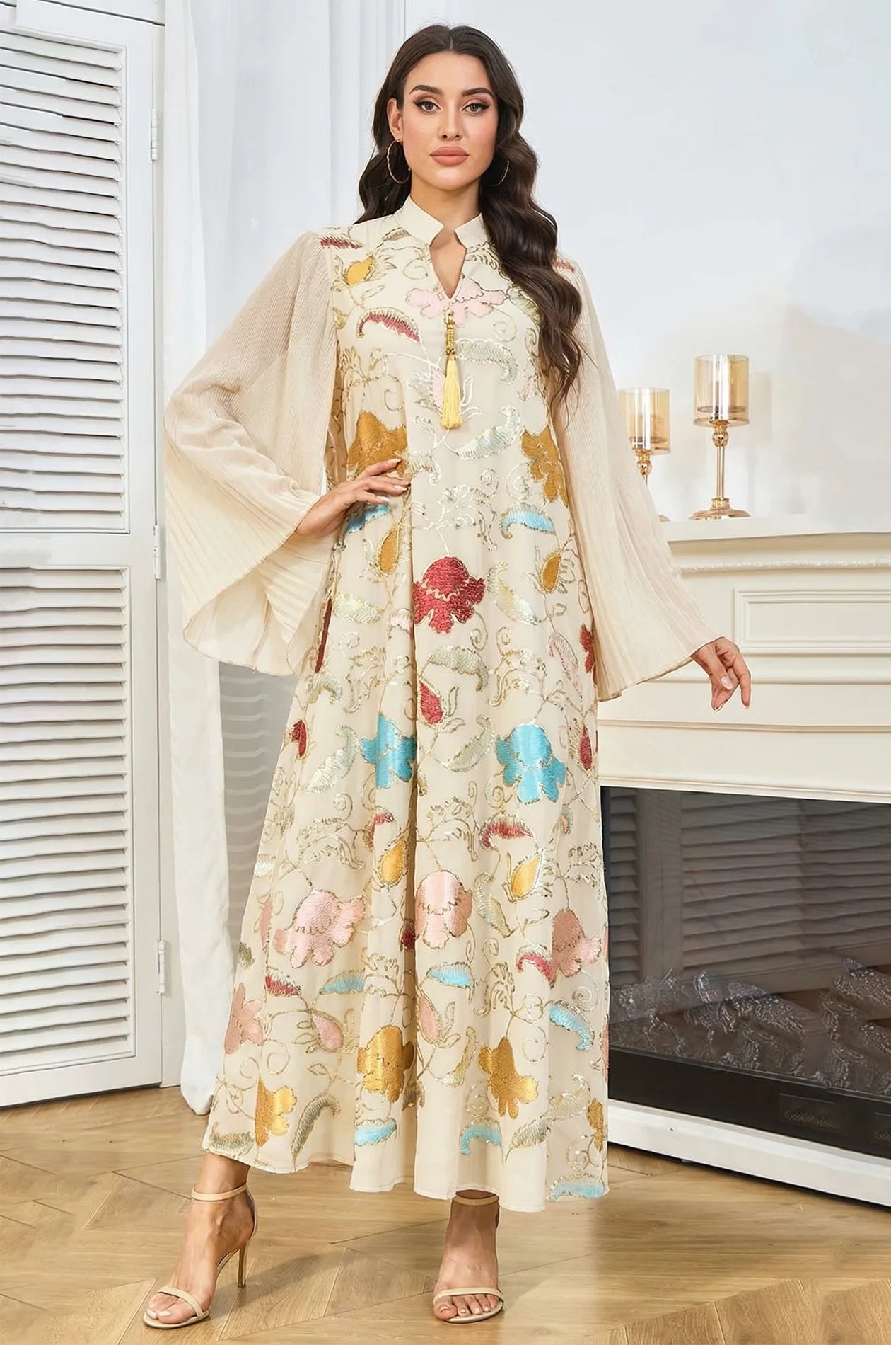 Full front presentation of the Marylin Ivory Kaftan, emphasizing the intricate contrast between the beige fabric and colorful sequins.