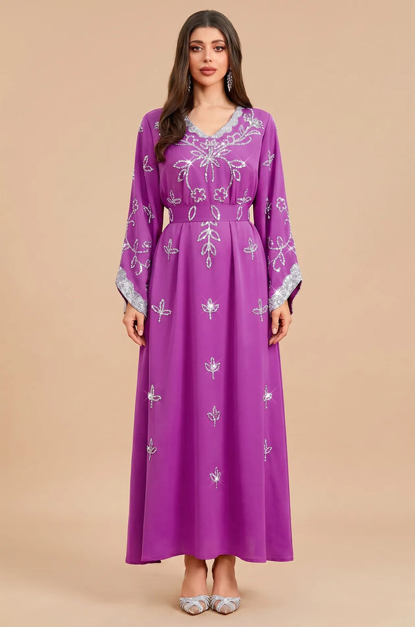 Full-length front view of the Maya Magenta Kaftan by Naylara with intricate silver rhinestone detailing.
