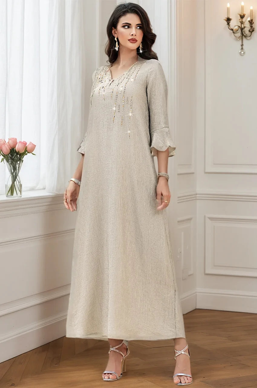 Elegant standing pose showing the drape of the Meira formal kaftan gown.