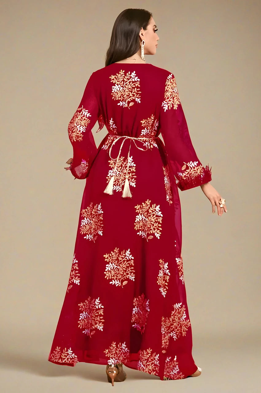 Back view of the Mhaya garnet feather-sleeve kaftan with tasseled rope belt and allover motifs.