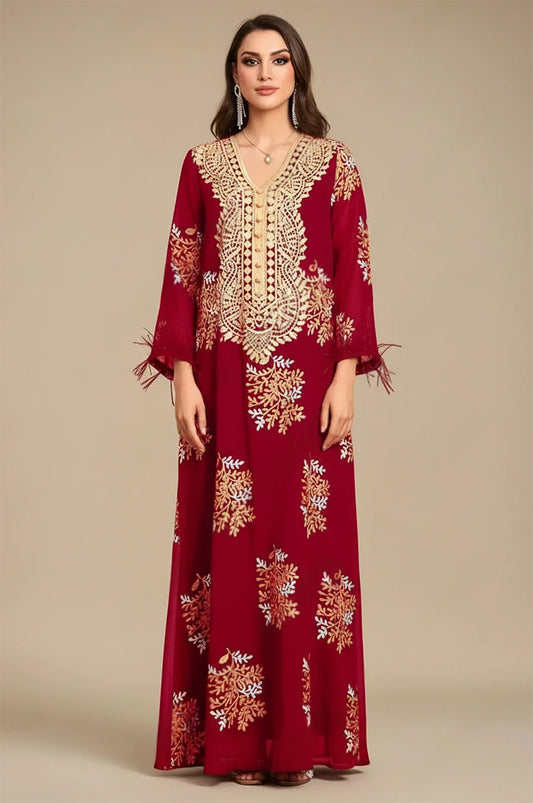 Front full view of Mhaya garnet red feather sleeve kaftan featuring ornate gold embroidered neckline with studio background