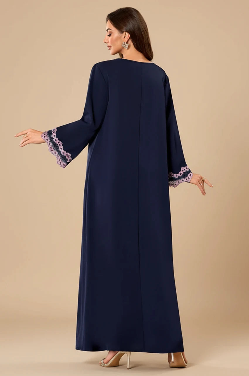 Back view of the Milah navy blue maxi dress showing solid color.