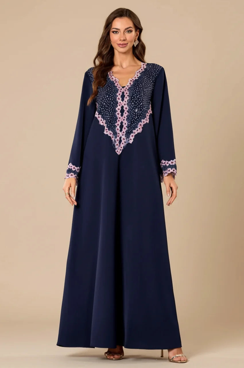 Full length view of the Milah navy blue evening kaftan.