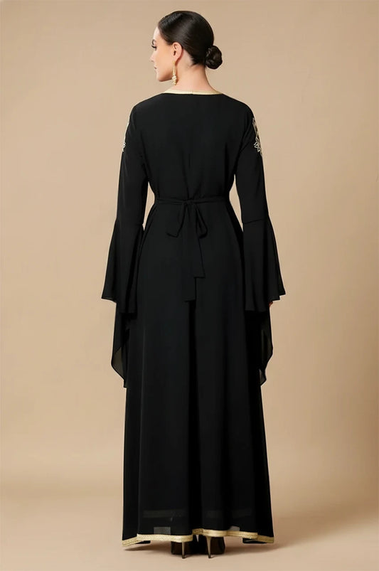 Miral black and gold kaftan back view with waist tie