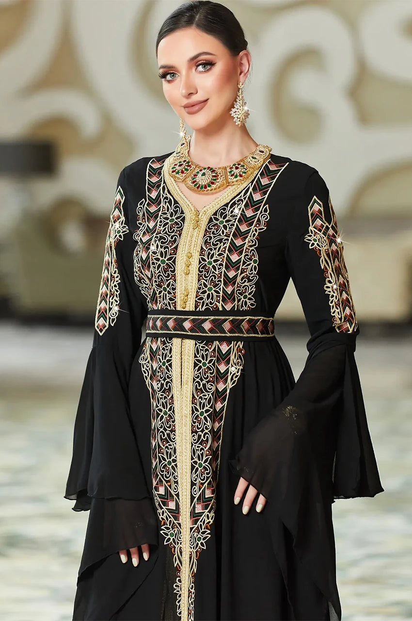 Close-up embroidery of Miral black and gold kaftan