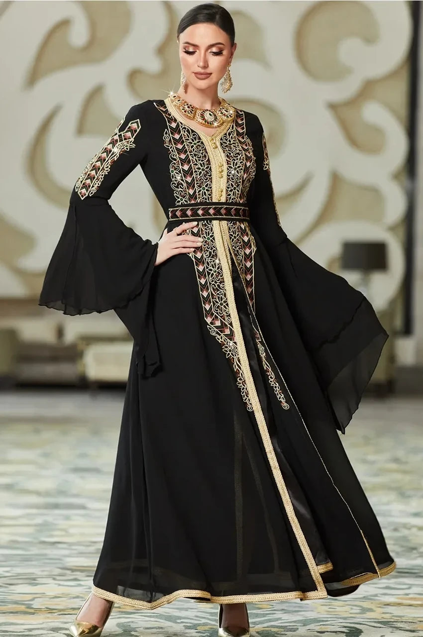 Flowing black and gold kaftan in movement
