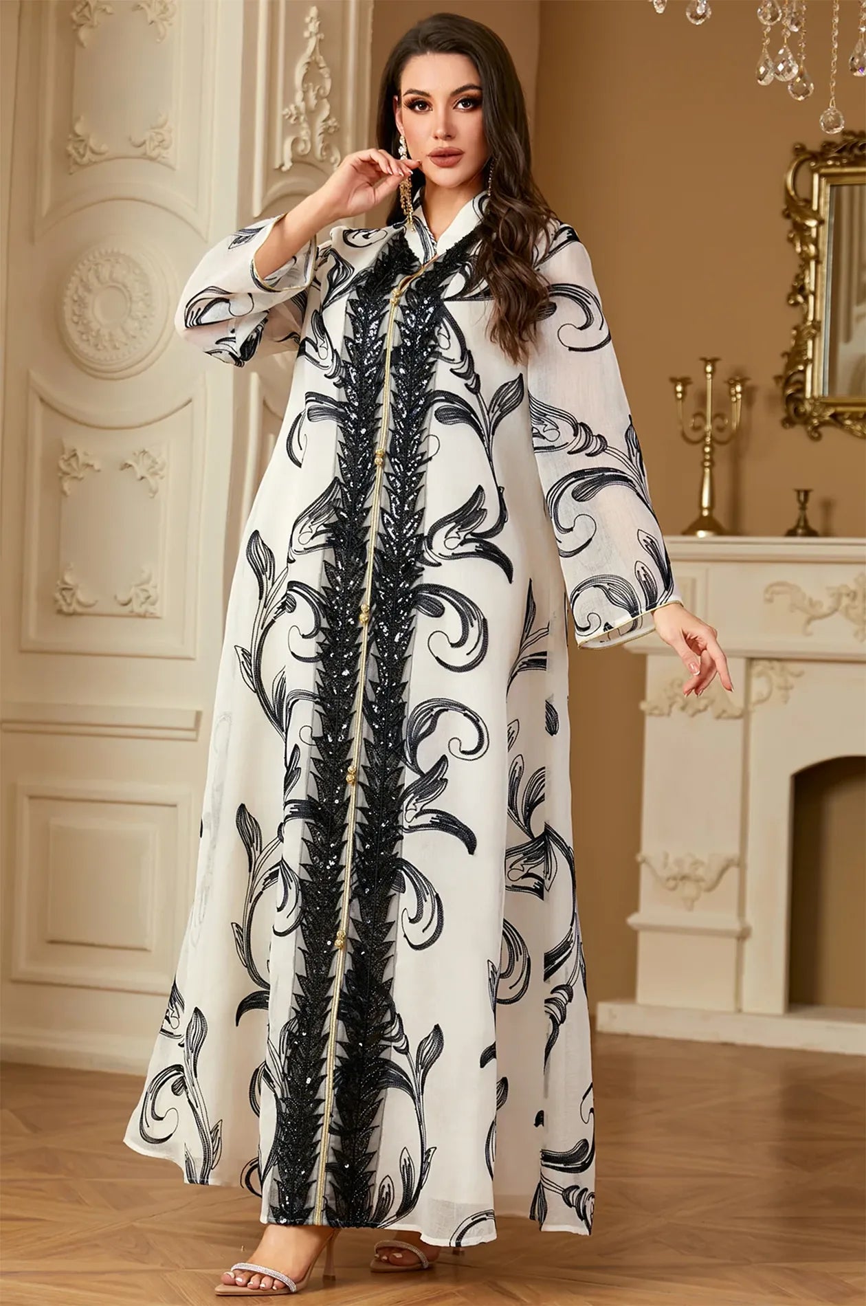 Close-up of the hand-beaded black embellishments on the Mylah kaftan.