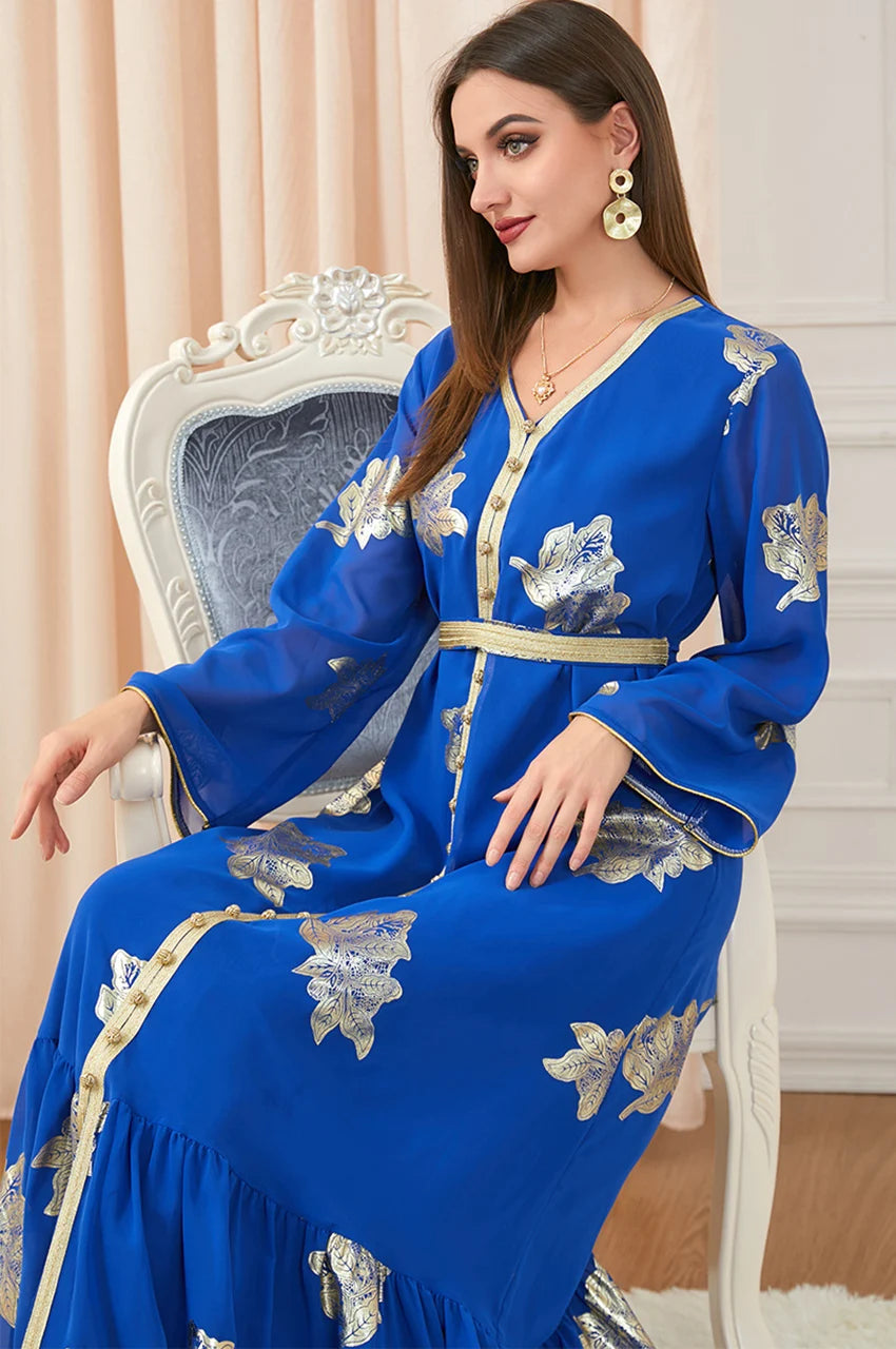 Close-up of gold floral embroidery and neckline on Myra blue vintage Moroccan kaftan