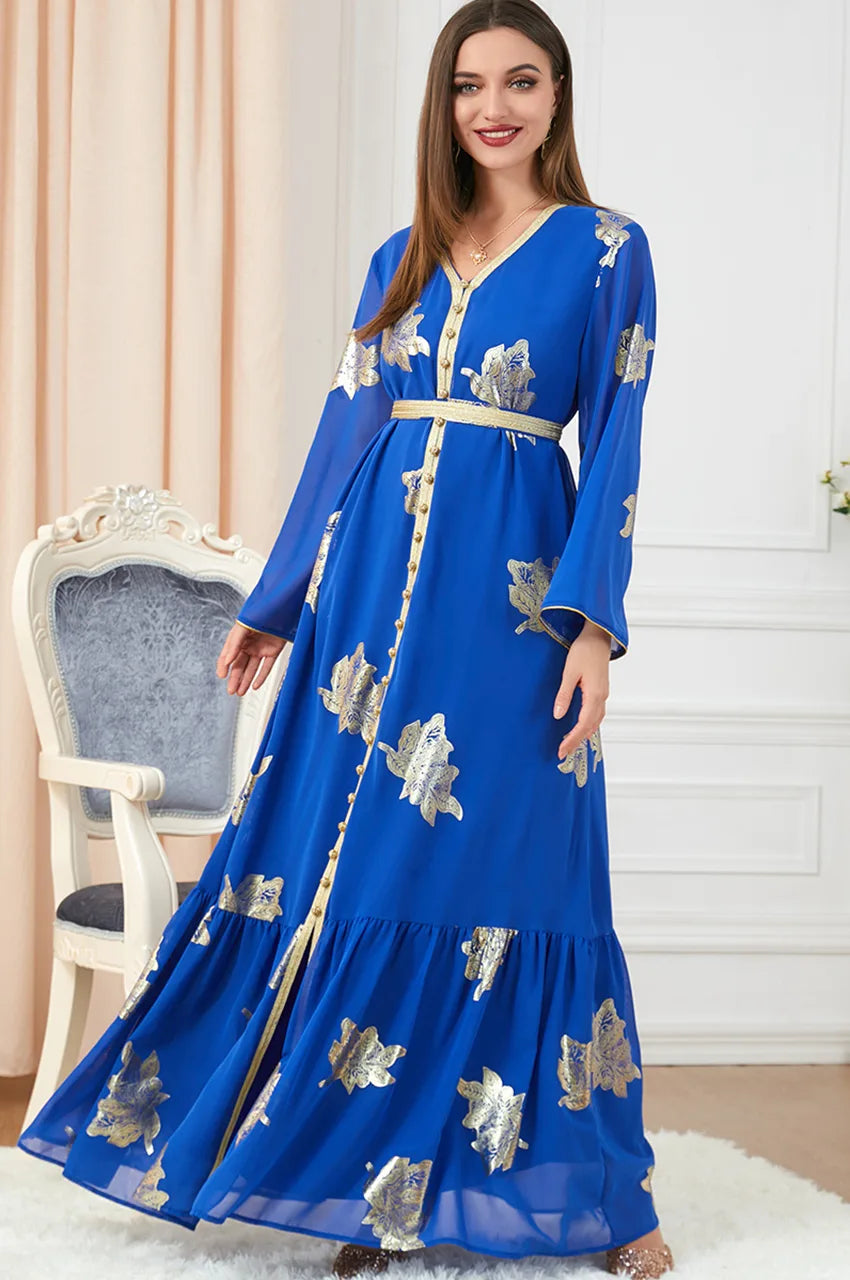 Flowing skirt movement of Myra blue vintage Moroccan kaftan with metallic gold embroidery